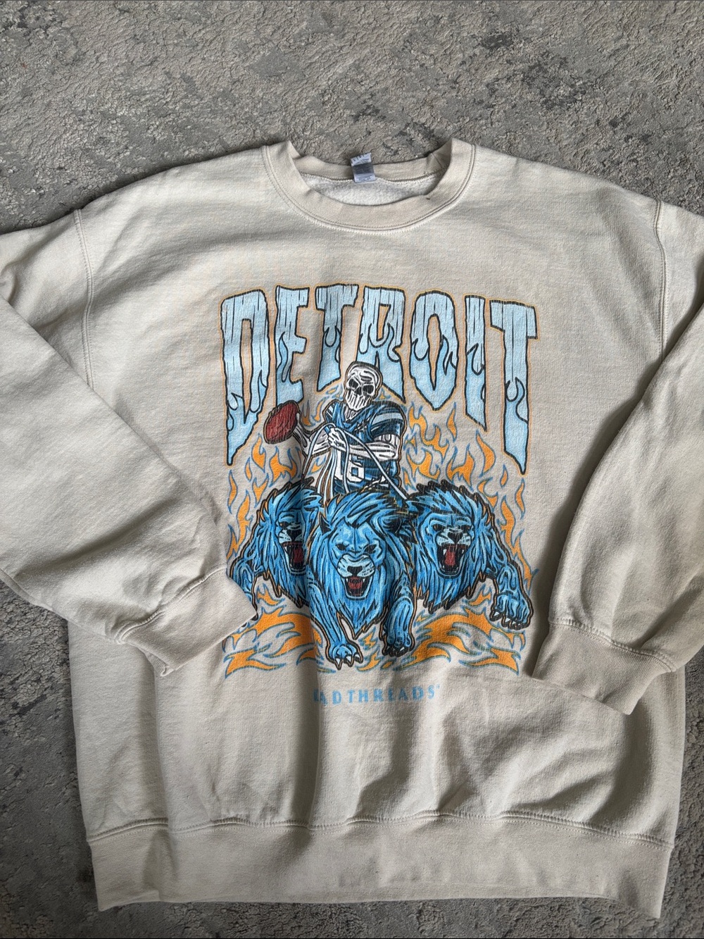 Gildan Cream Crewneck with Blue Lion Graphic and Orange Flames
